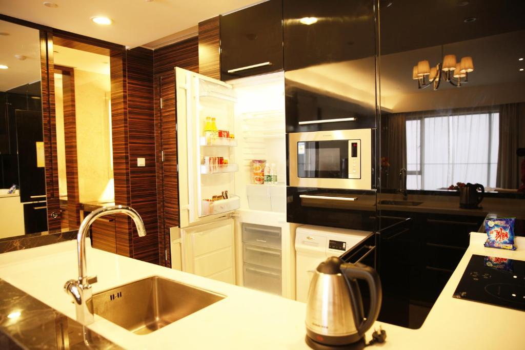Checkinn International Apartment Cantão Quarto foto